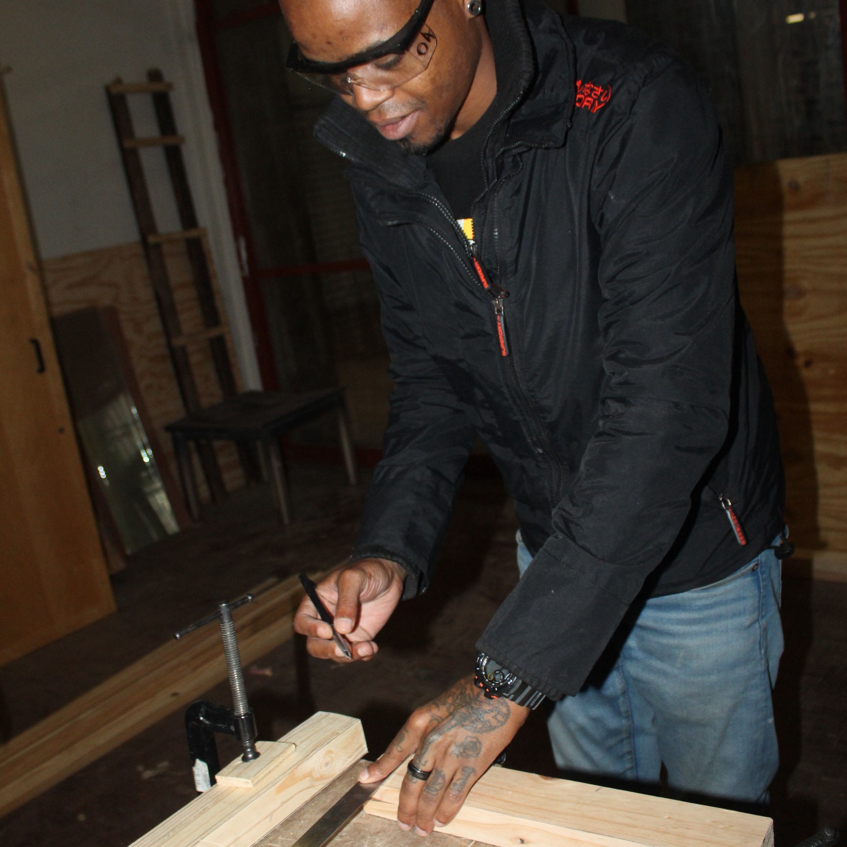 A student in one of Outreach Foundation's carpentry classes