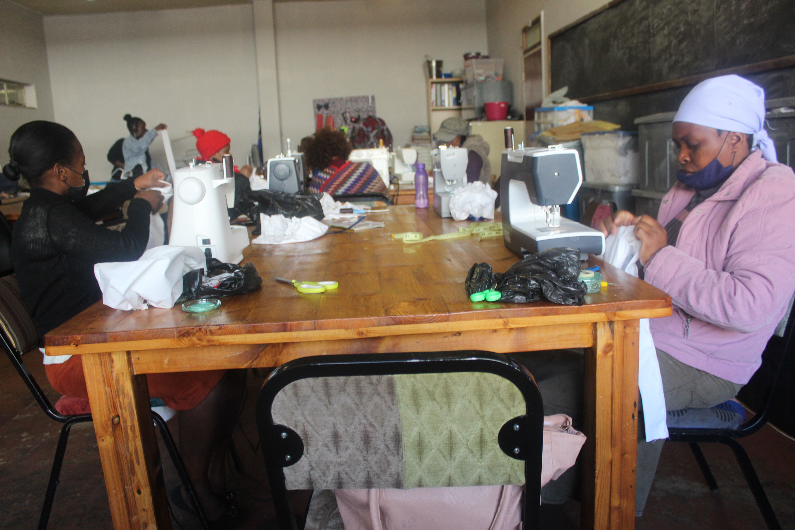 Students learn valuable sewing skills in Outreach Foundation's sewing classes